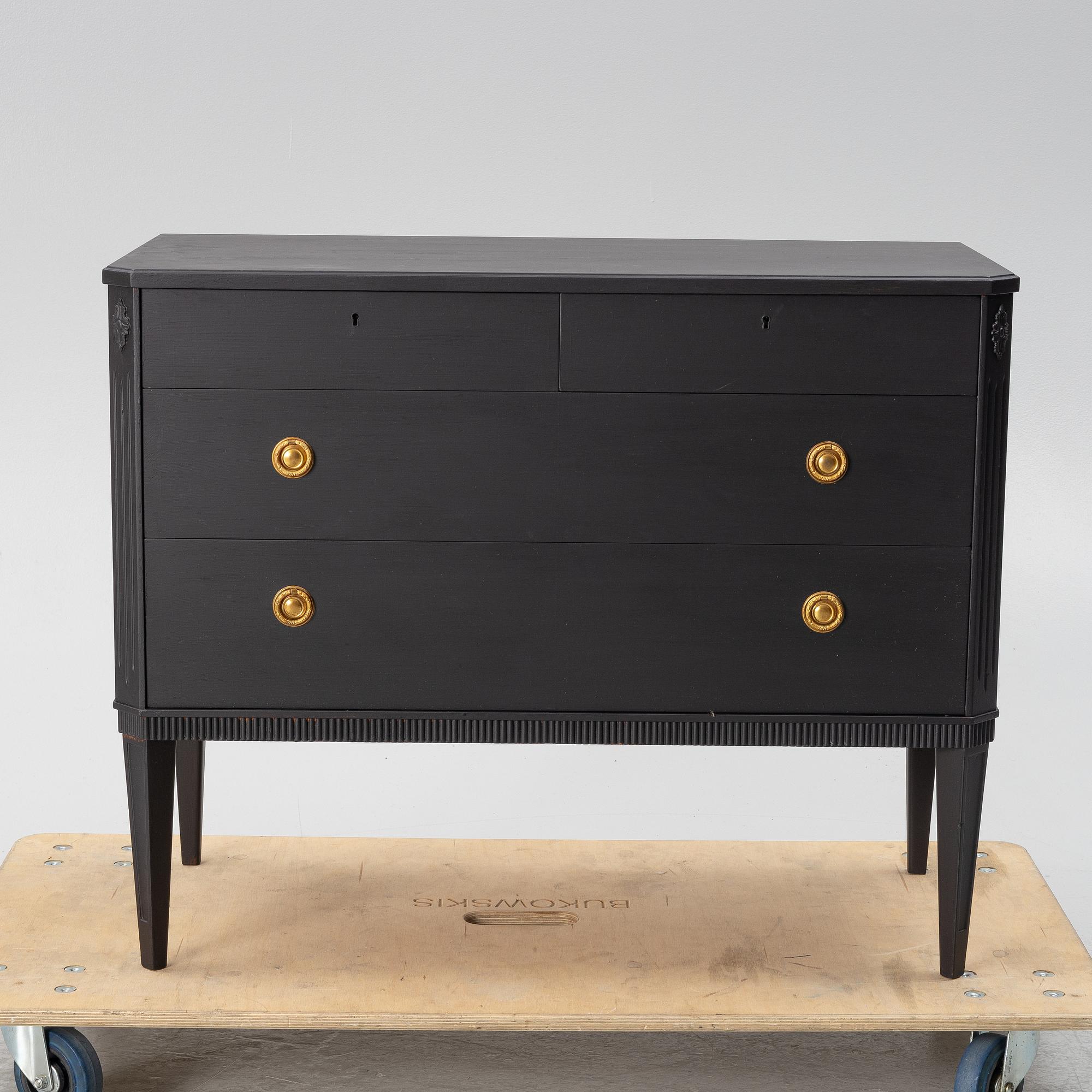 A chest of drawers, mid-20th century.