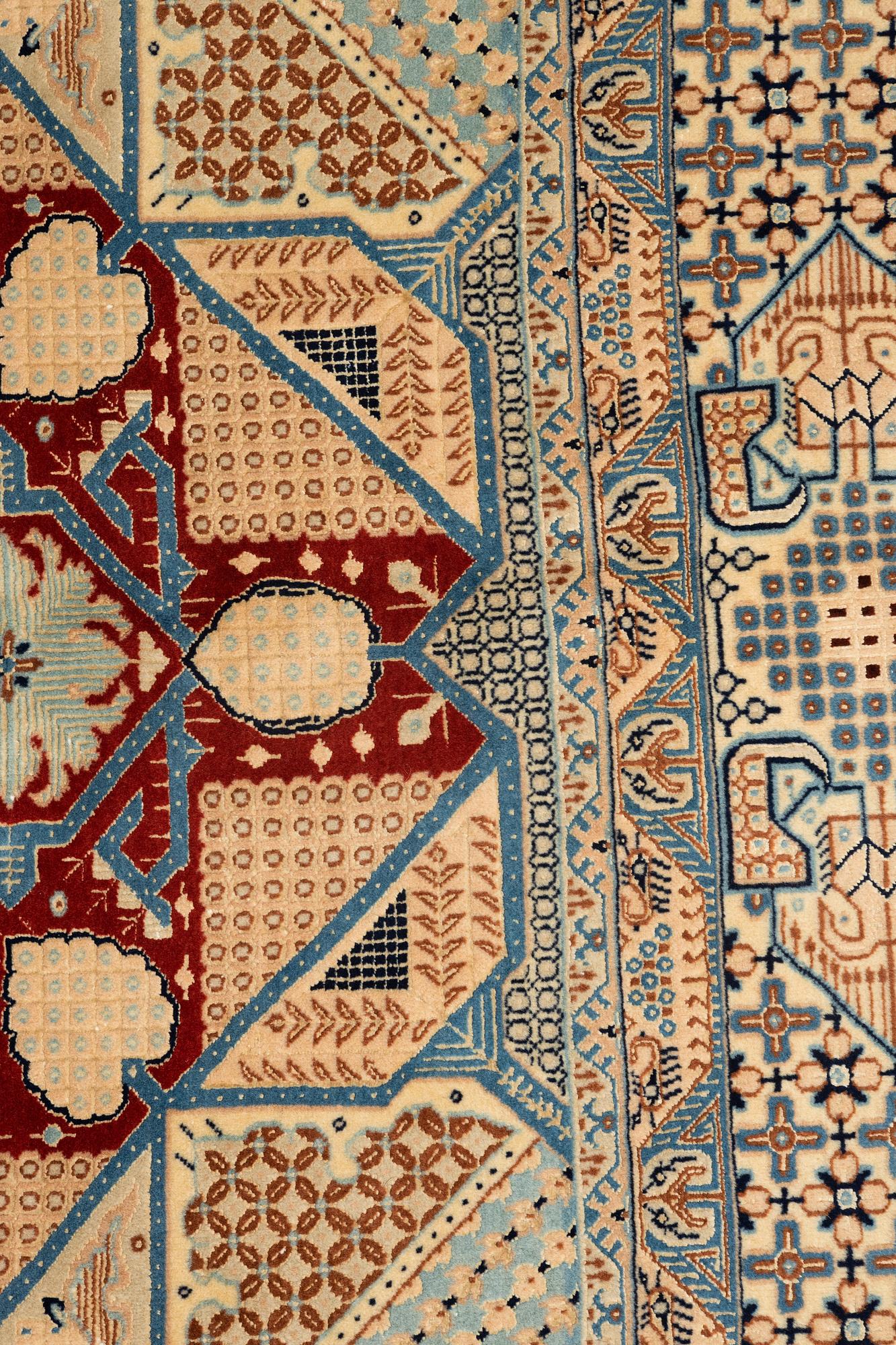 A rug, Old Nain, part silk, ca 257 x 165 cm.