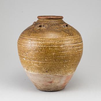 A olive green glazed jar, South East Asia, 18th Century or older.