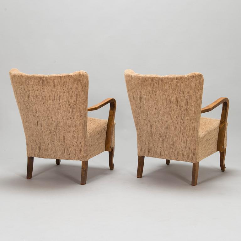 A pair of 1930/1940's open armchairs so called 'K-chair'.