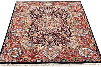 A Kashmar carpet, a. 300 x 200 cm.