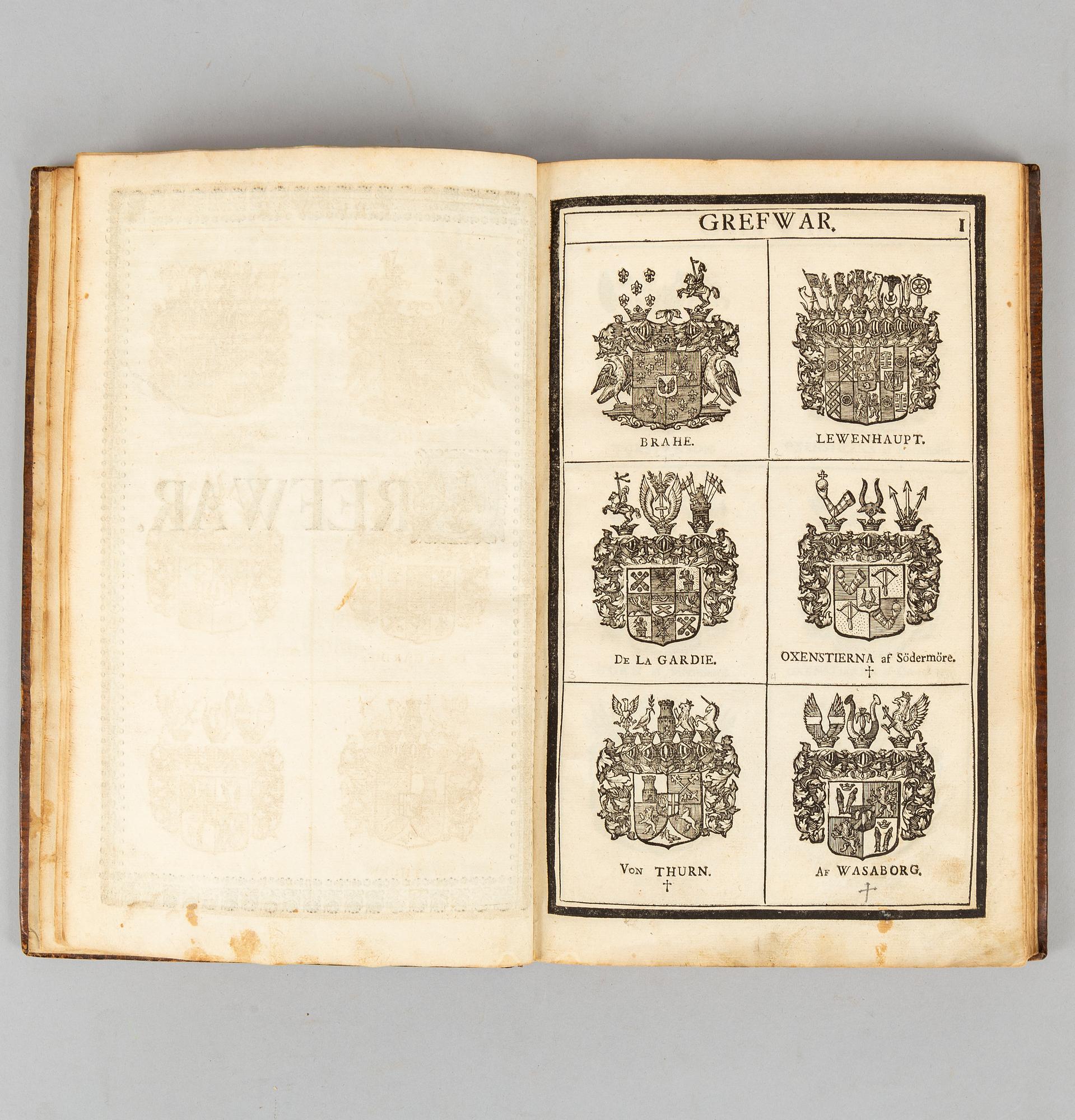 Med hundratals adelsvapen i träsnitt, 1734.