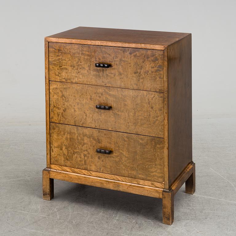 AXEL LARSSON, a stained birch chest of drawers from Svenska Möbelfabriken, 1930's.