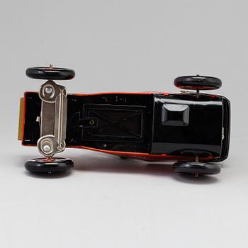 A toy metal car "Sunday Driver", Kosuge, Japan, and "Giant Helicopter", YF, Japan. 1960s.