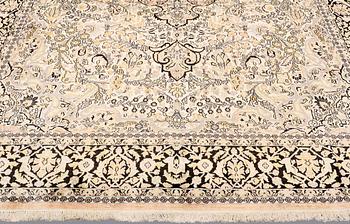 A CARPET, old silk Kashmir, ca 380 x 274 cm.
