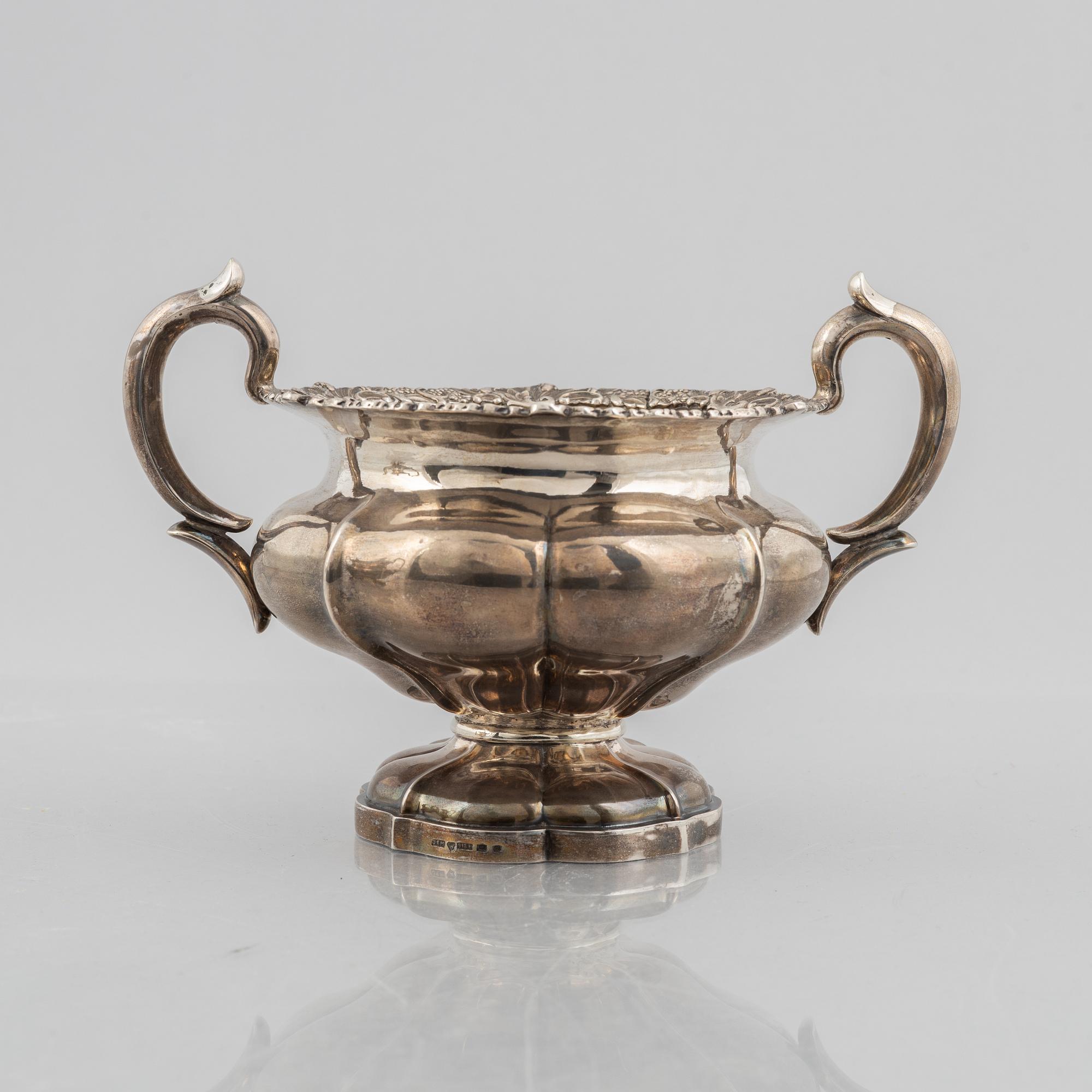 A silver coffee pot and a sugarbowl, marks of J. Mynttinen, Helsinki, Finland 1932.