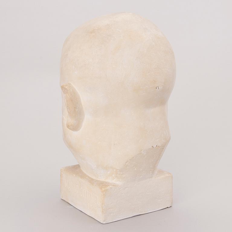 A plaster sculpture signed Mauno Oittinen 1929.