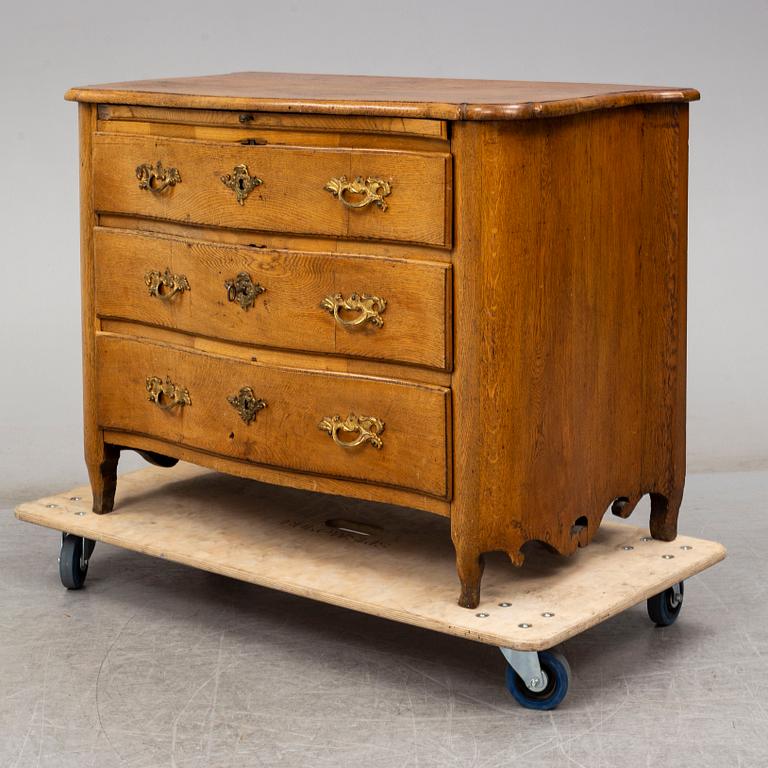 A 18th century rococo chest of drawers.