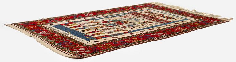 A pictoral Qashqai rug, Southwest Persia, c. 222 x 152 cm.