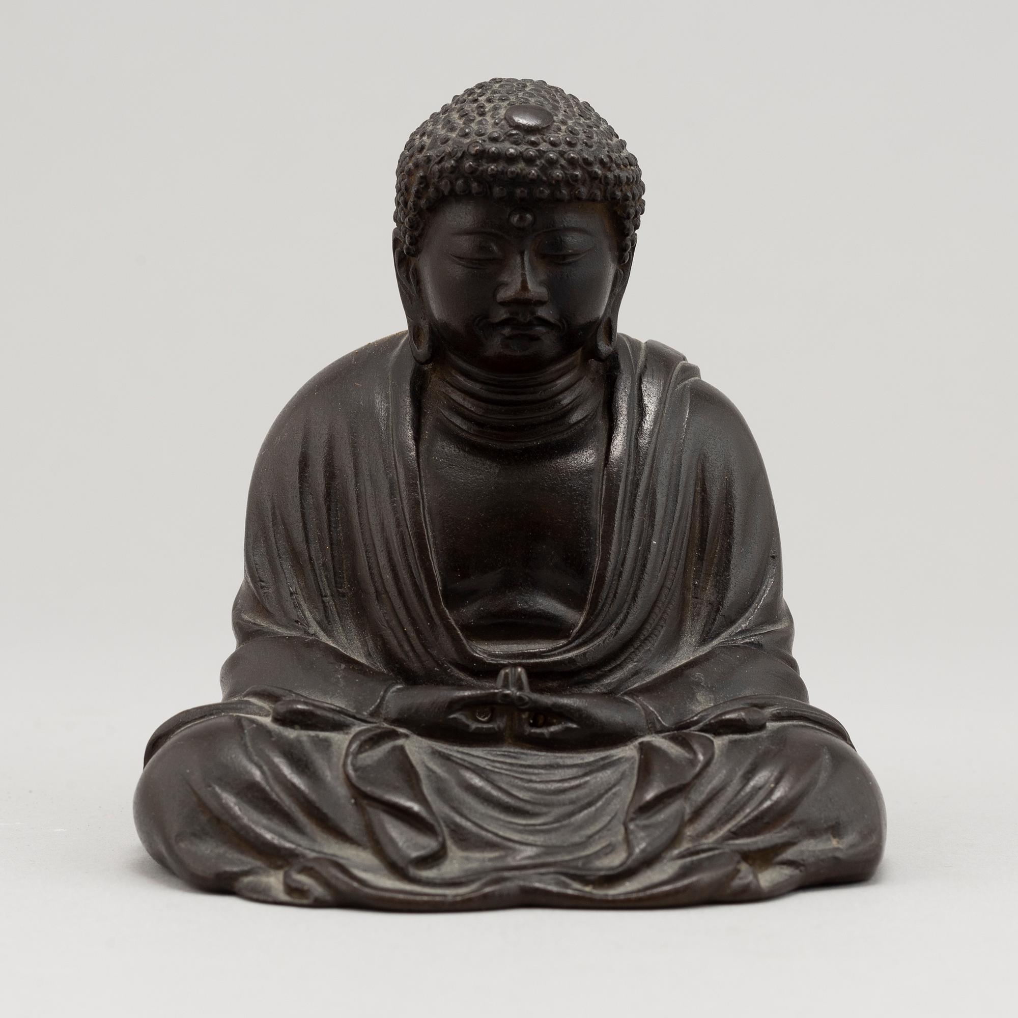A Japanese seated bronze okimono of Amitabha buddha, 20th century.