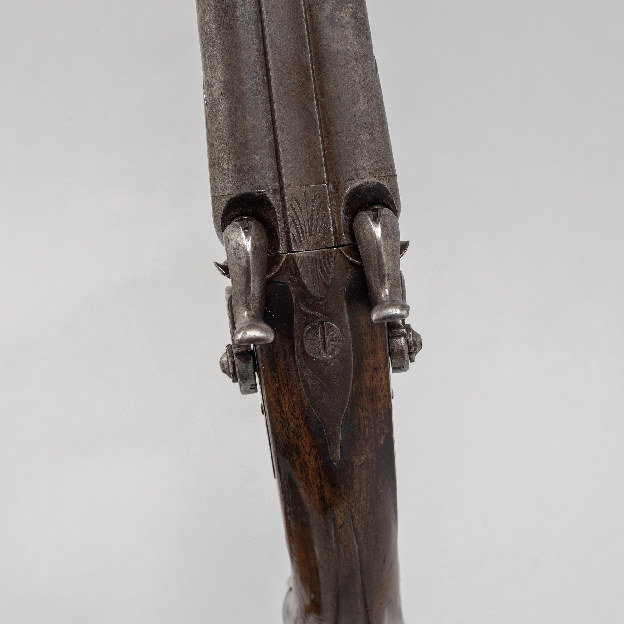 A double-barrelled percussion pistol, second half of the 19th century.