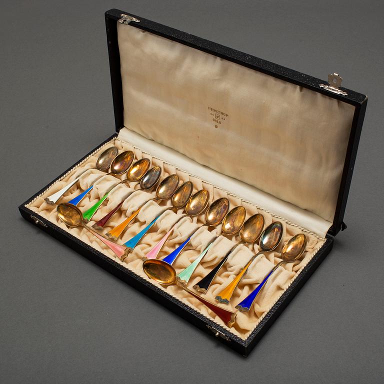 J TOSTRUP, 14 silver gilt and enamel coffee stoons from Oslo, Norway.
