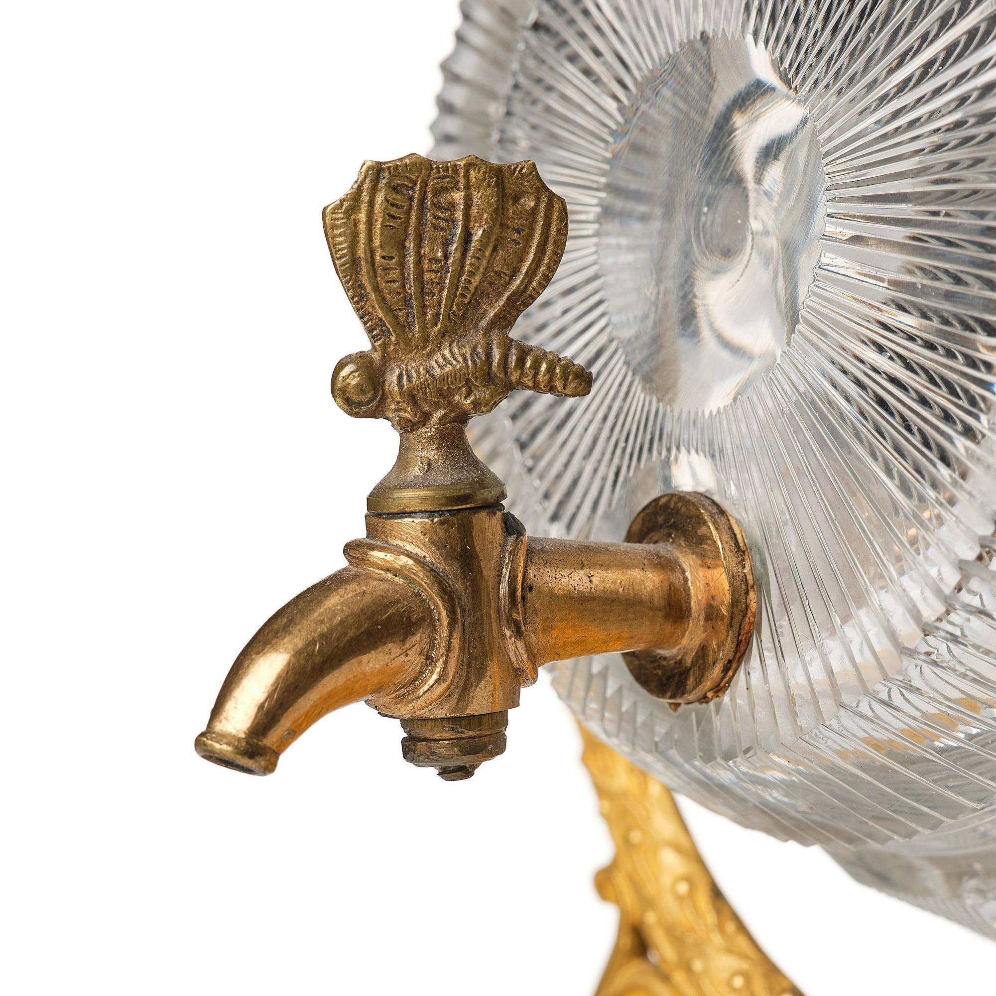 A Empire ormolu-mounted cut glass wine barrel.