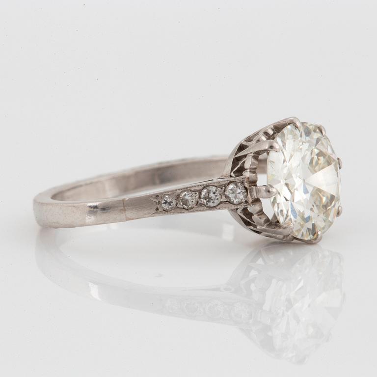 A platinum ring set with an old-cut diamond ca 2.25 cts quality ca K/L vs.