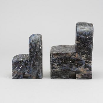 POUL ISBAK, a set of two signed and dated sculptures.