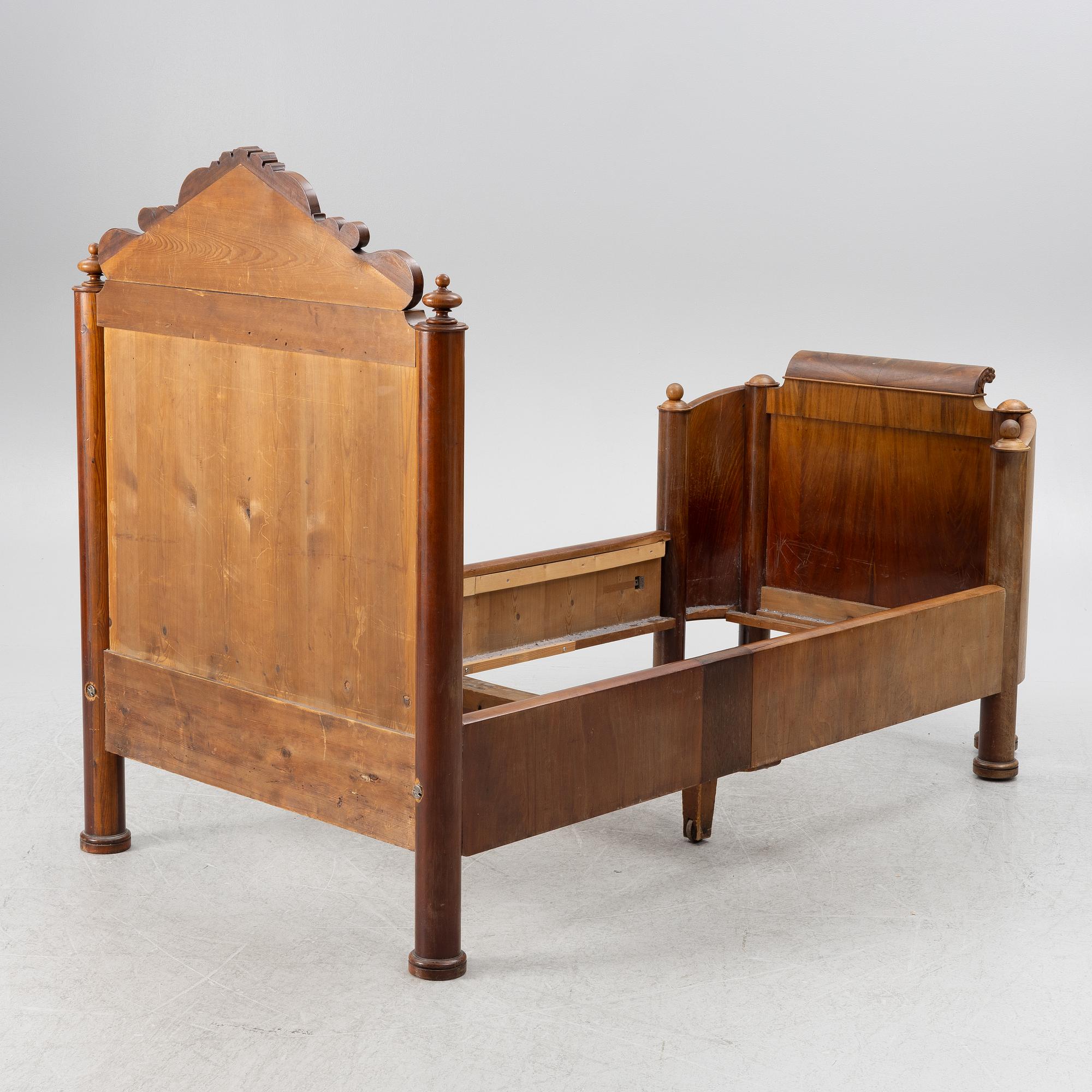 A late Empire bed, mid-19th century.