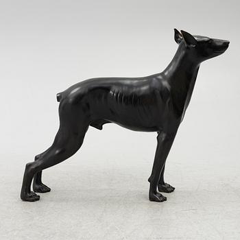 A decorative sculpture of a dog, 20th/21st century.