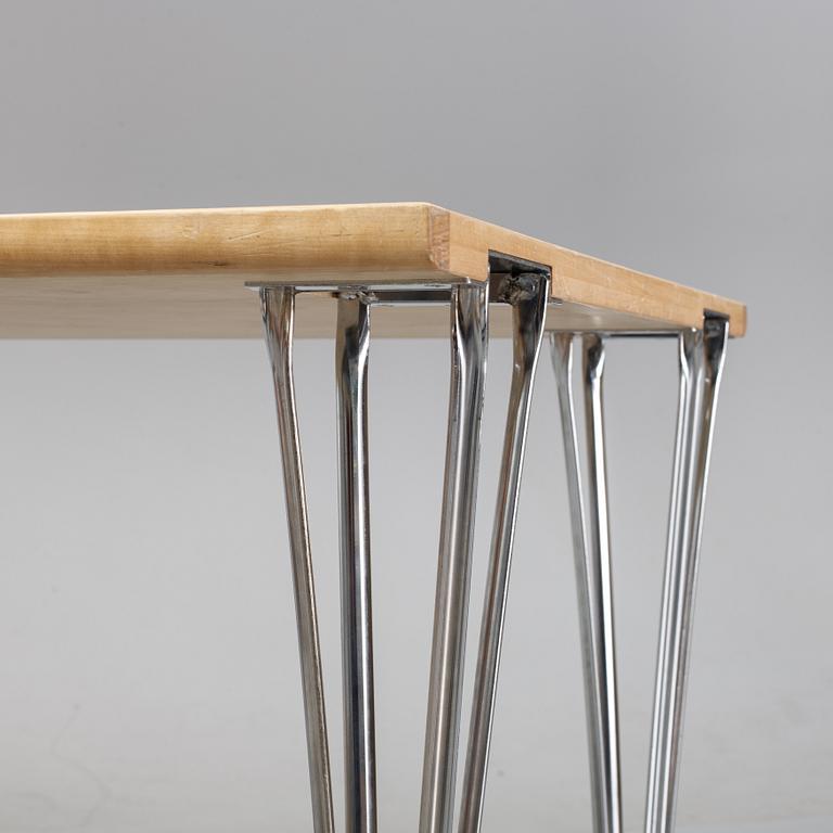 A birch and leather dining table produced by Mathsson International, 21th century.