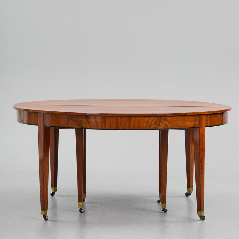 A George III mahogany D-end dining table, circa 1800.