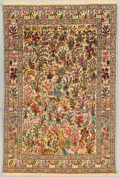 An oriental souf carpet, signed Ali pourabadi, around 295 x 195 cm.