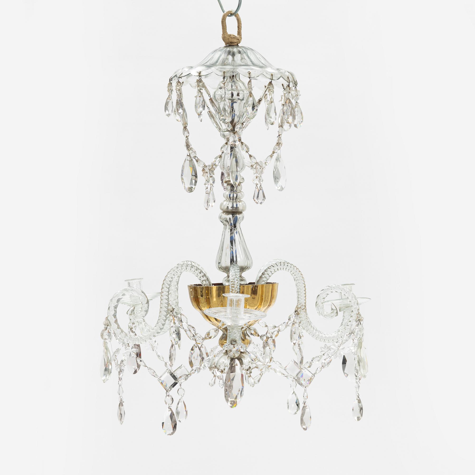 A European glass three-light chandelier, circa 1800.