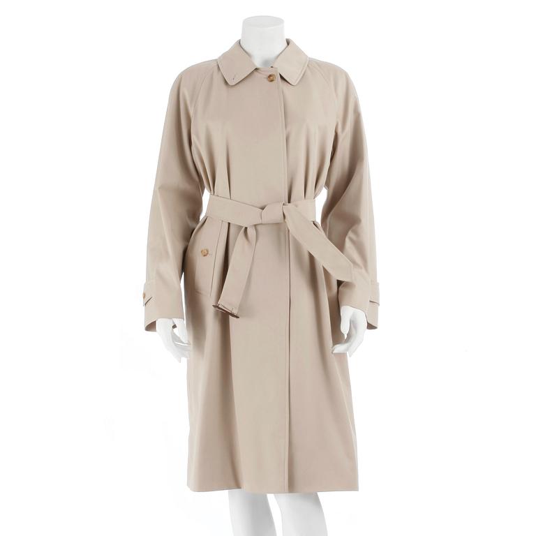 BURBERRY, a beige cotton blend trench coat and a shawl.