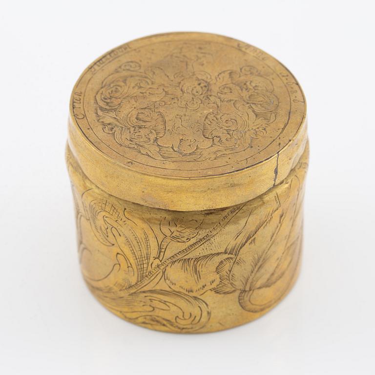 A presumably German baroque brass box, dated 1686.