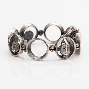 Jorma Laine, Rannekoru "Mörökölli", sterlinghopeaa. Turun Hopea, Turku.