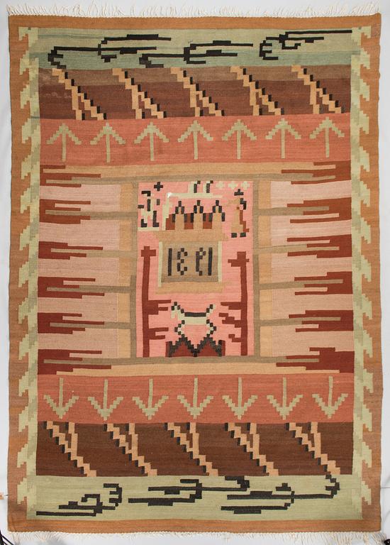 A 1930's Finnish flat weave carpet. Circa 300 x 205 cm.