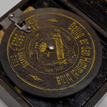 A GERMAN MUSICAL BOX, with 23 songs, 19th century.