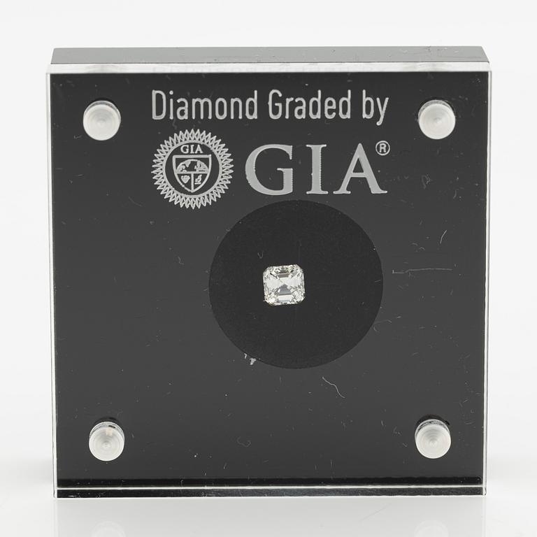 Emerald-cut diamond, 0.54 ct, with accompanying GIA dossier.