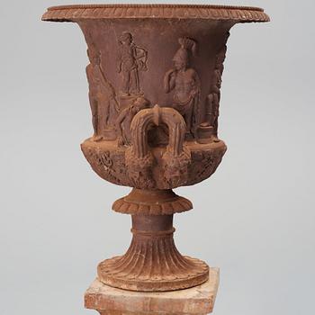 An around year 1900 iron garden Medici vase.