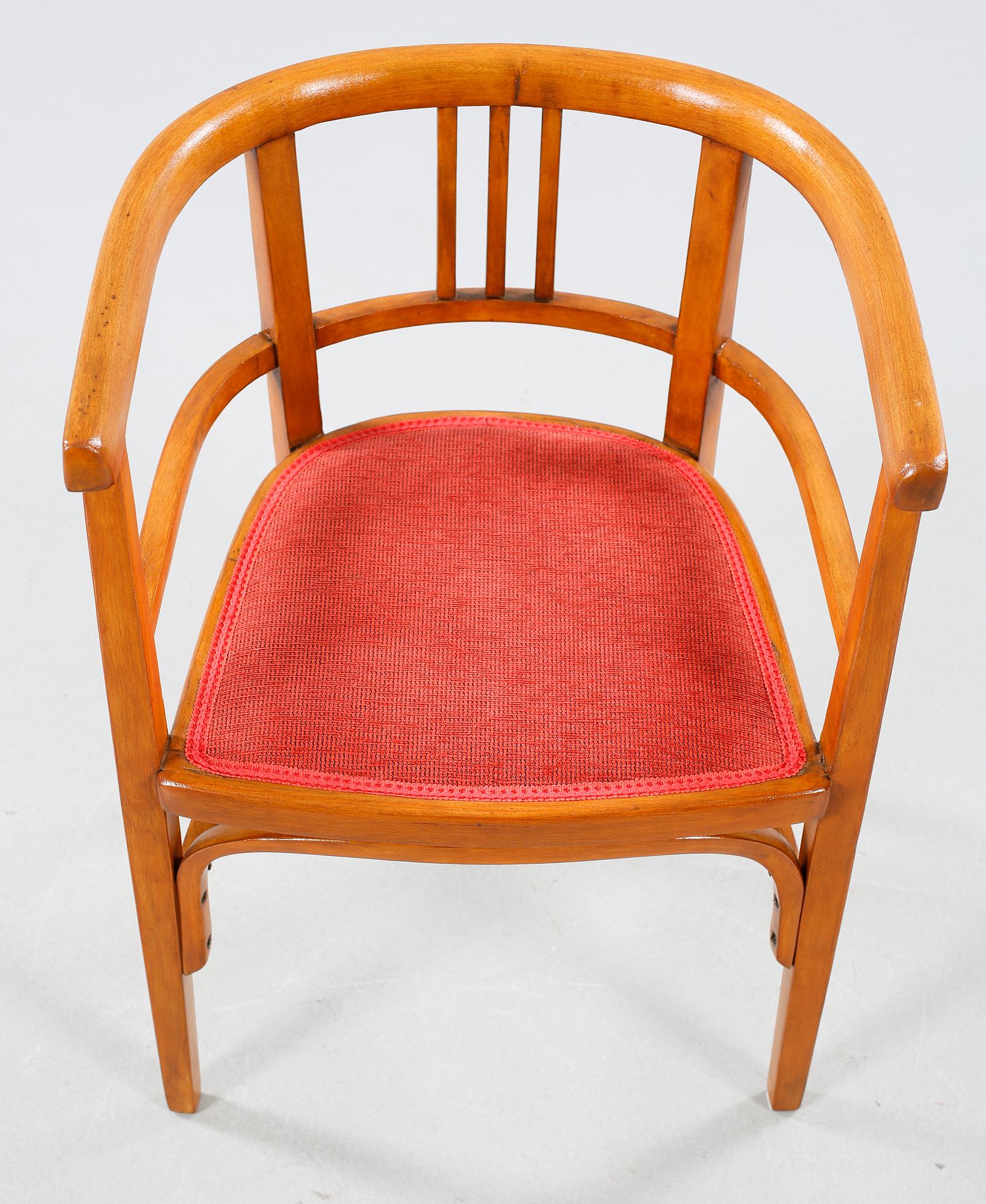 A table and a arm chair from the second quarter of the 20th century.