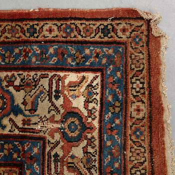 A carpet, an antique Mahal, Ziegler pattern, ca 371,5-374,5 x 265-266 cm (as well as a little flat weave at one end).