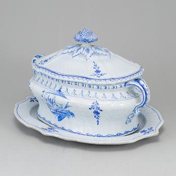 A Swedish Rörstrand faience tureen with cover and stand, 18th Century.