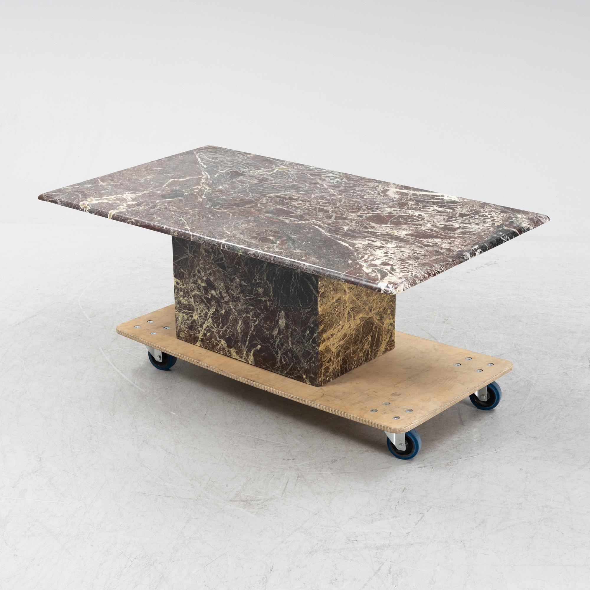 A stone coffee table, late 20th Century.