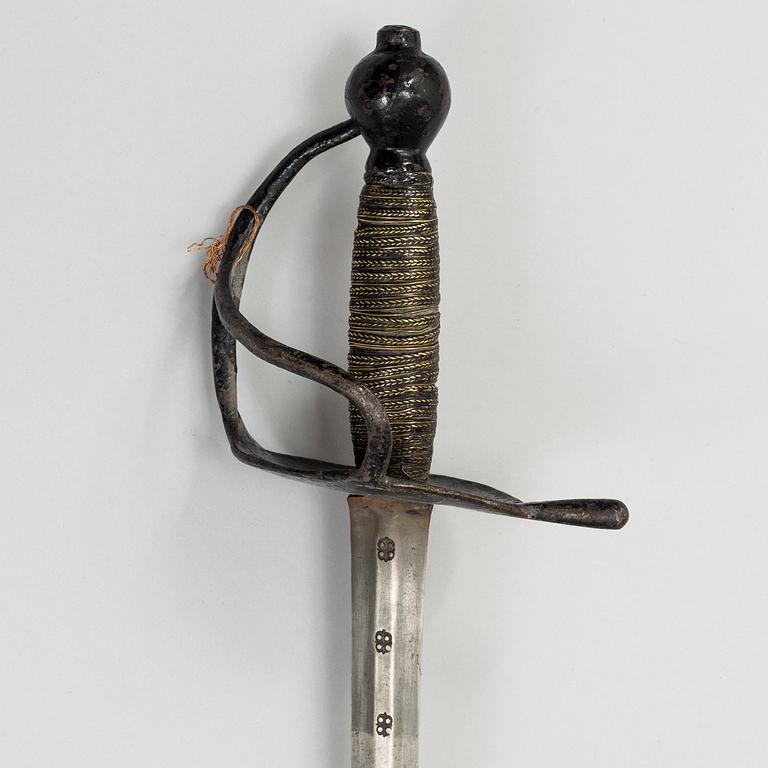 A Swedish Navy cutlass 1832 pattern.