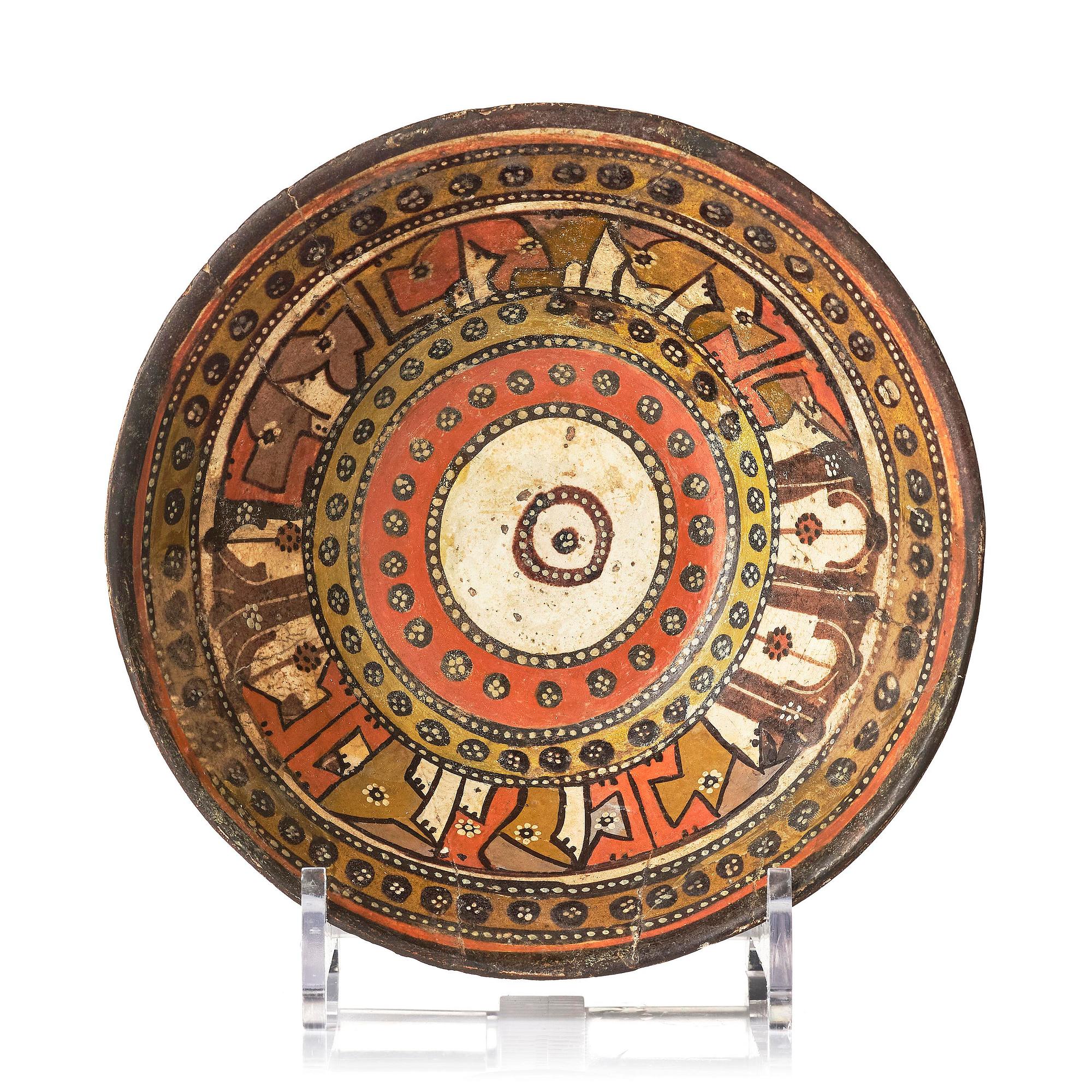 A conic pottery bowl, probably Nishapur, Northeast Persia, 10th century.