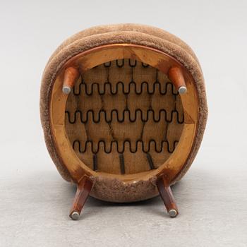 A mid 20th century easy chair,.