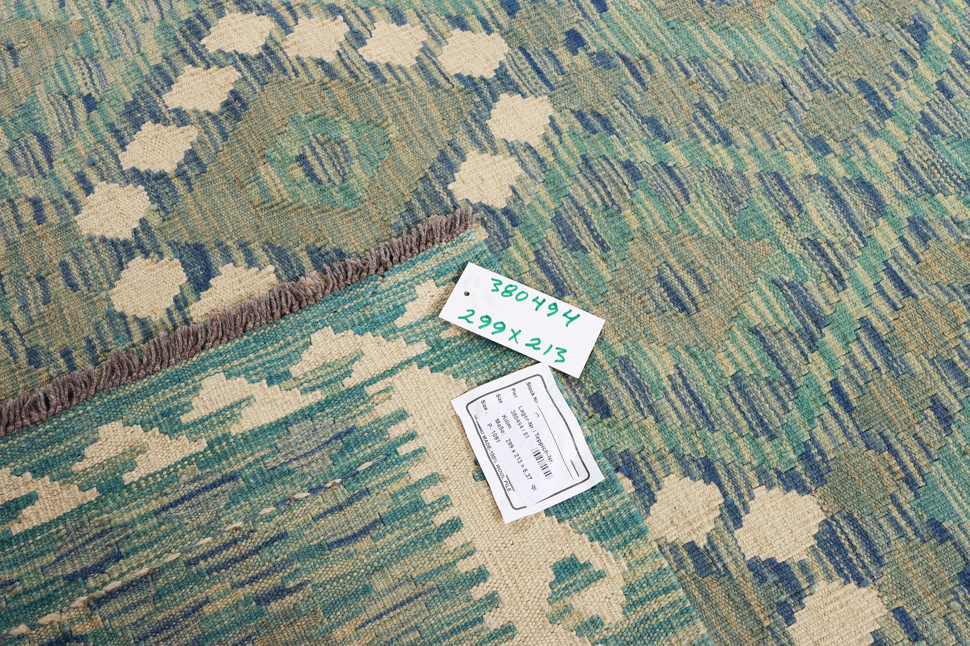 An Afghan kilim carpet, c. 299 x 213 cm.