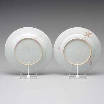 A pair of famille rose 'double peacock' dishes, Qing dynasty, Qianlong (1736-95).