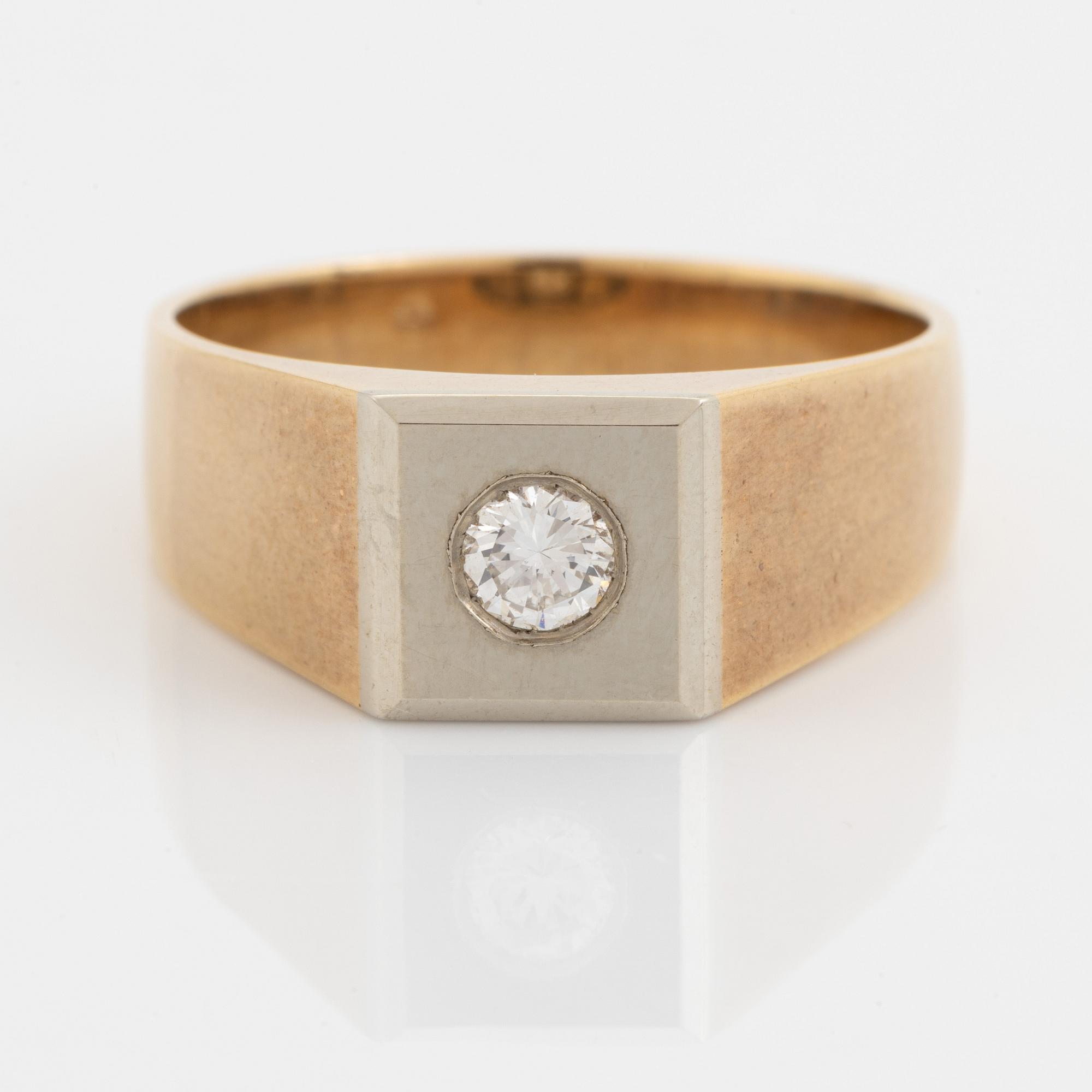 Ring, klackring 18K guld med briljantslipad diamant.