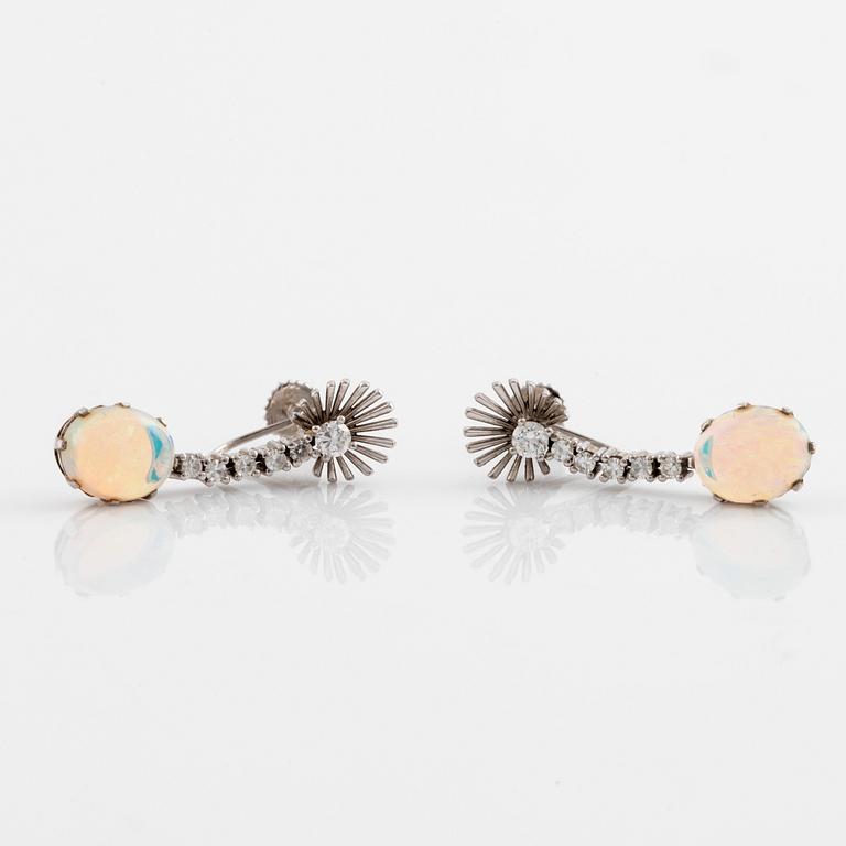 Opal and round brilliant cut diamond earrings.