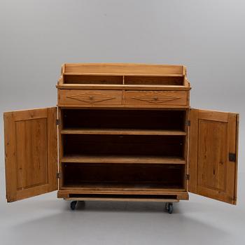 A late gustavian cupboard from the first half of the 19th century.