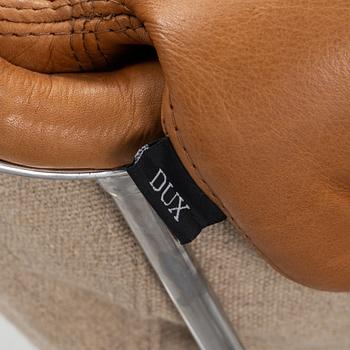 Bruno Mathsson, fåtölj med fotpall och läsplatta, "Jetson", Dux.