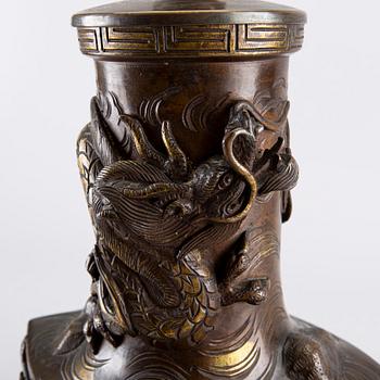 An early 1900's Japanese bronze table lamp.