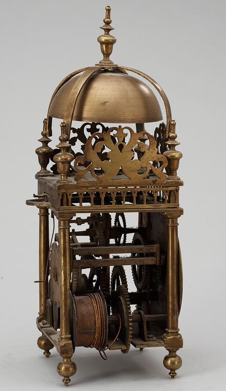 An English middle 17th century brass lantern clock signed Thomas Loomes At The Mermayd In Lothbury.