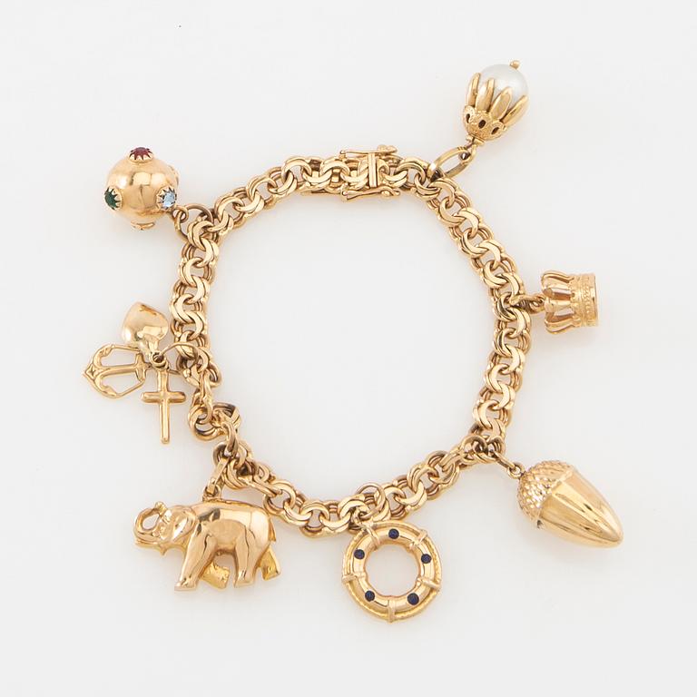 Armband Bismarck-länk 18K guld med berlocker.