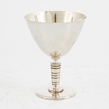 Folke Arström, eight silver plate cocktail glasses and a shaker, GAB.