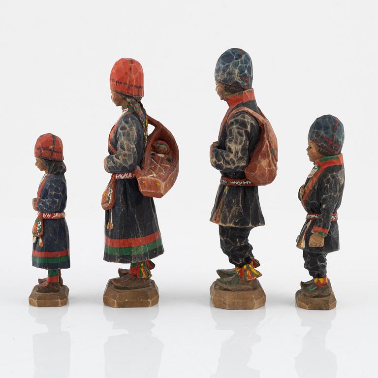 Torborg Lindberg, four carved and painted wooden figures, signed T.L.